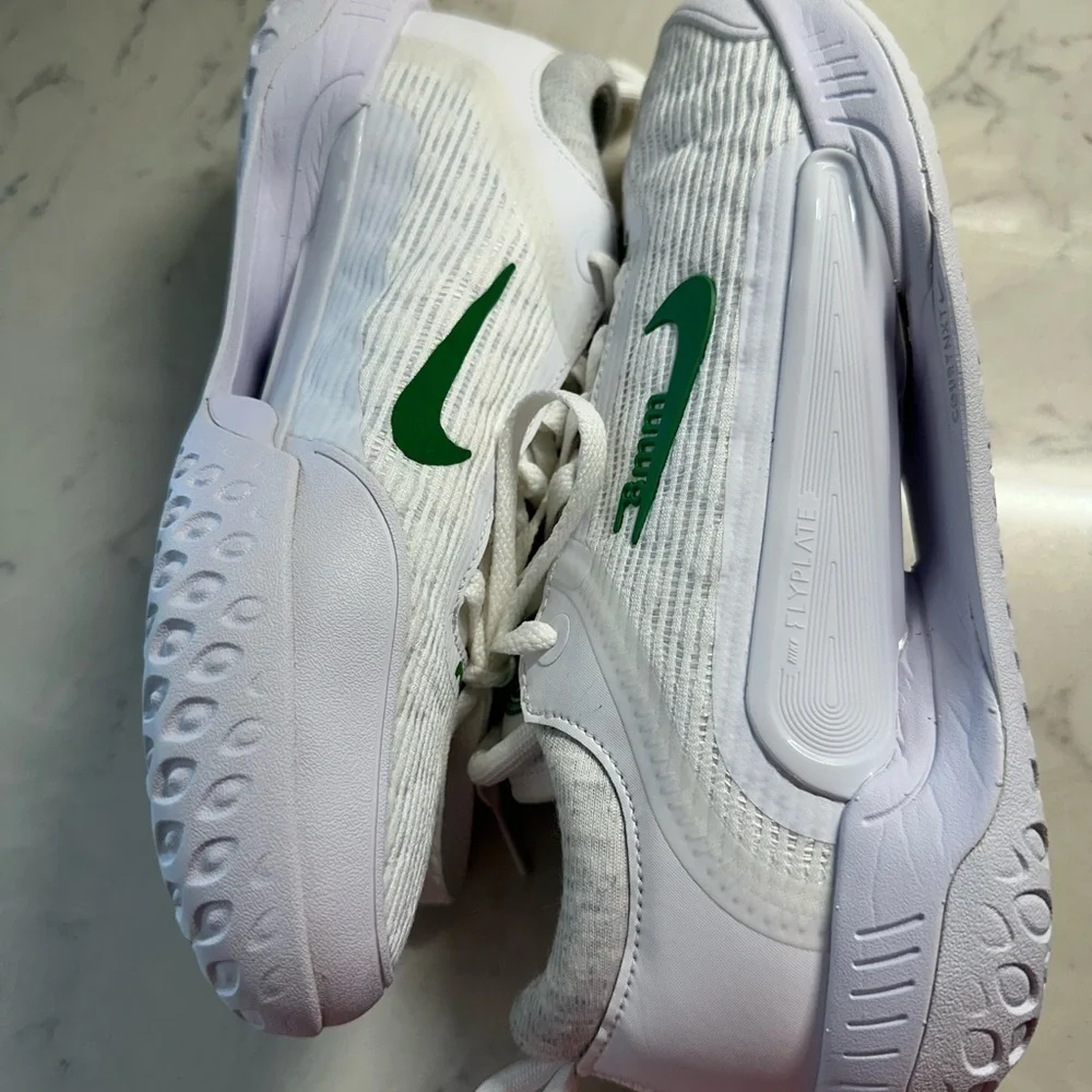 Nike White and Green Athletic Shoes with Cushioned Sole